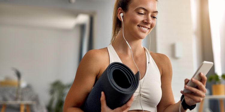 Stay Motivated and Informed: 5 Fitness Podcasts to Listen to While Working Out 
